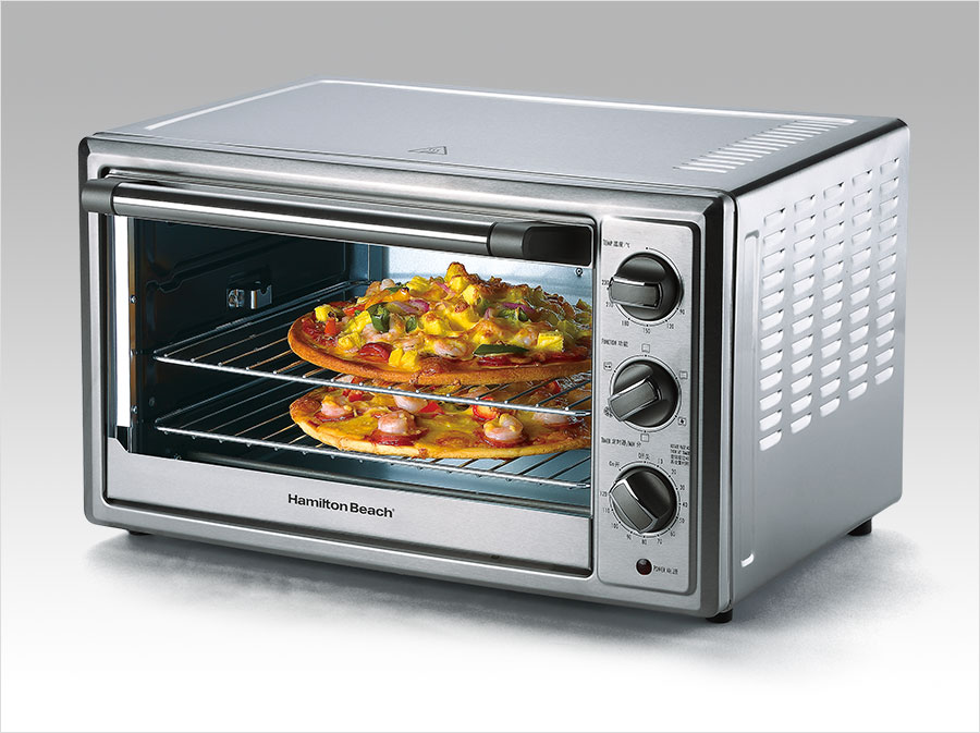 黑眼睛广告为汉美驰拍摄的电转大容量台式烤箱应用图-烤披萨